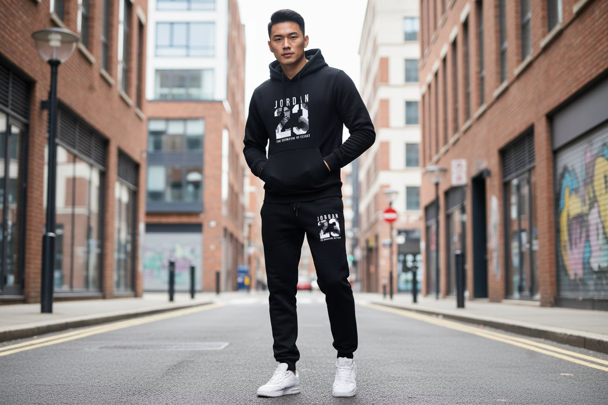 Black hoodie and pants set with 'Jordan 23' design on a white background