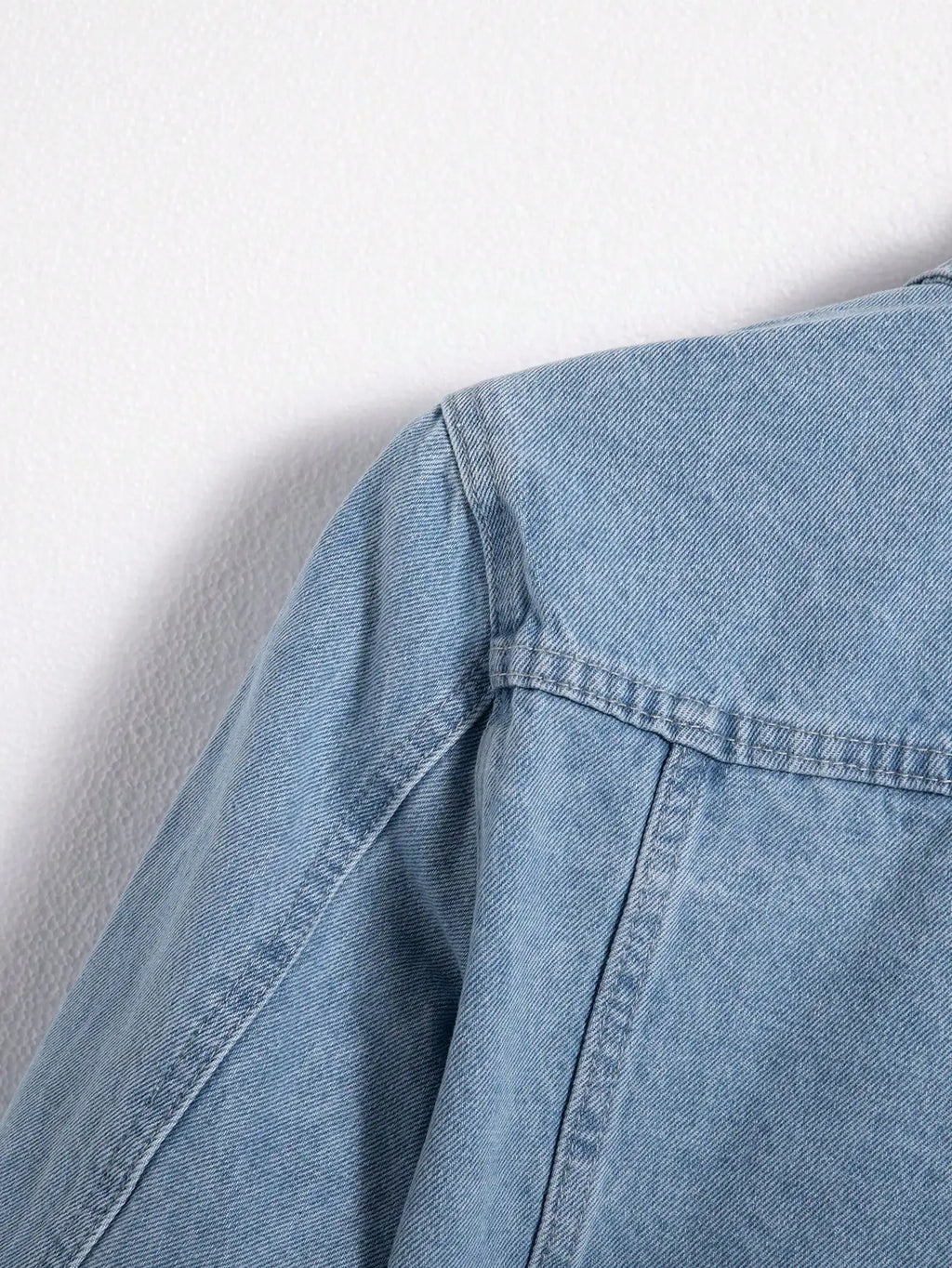 Men's denim jacket for spring and autumn. Blue denim coat. Daily casual wear. Fashion trend.